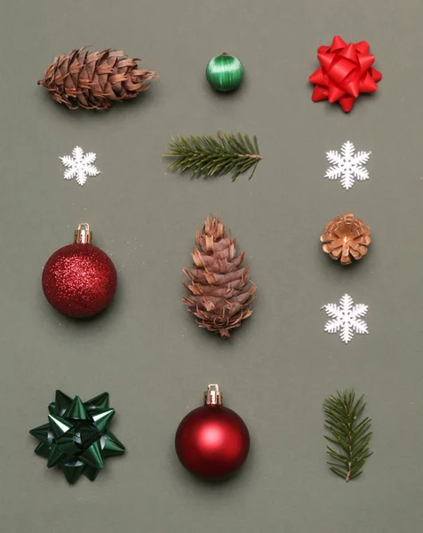 Christmas decoration set flat lay on green background.  Christmas, winter holiday, new year concept.