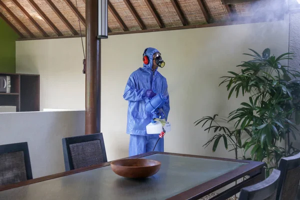 Cleaning and disinfecting: Key weapons in the fight against contagious diseases. Spray disinfection of surfaces in the house.Fogging with disinfectant due to coronavirus.
