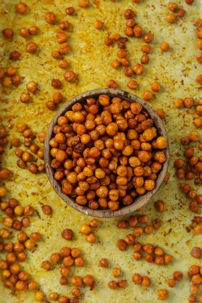 Roasted chickpeas seasoned with turmeric and chilli powder