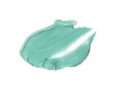 Beyaza izole edilmiş doğal kozmetik çamur örneği. Çamur lekesi. Kapat..