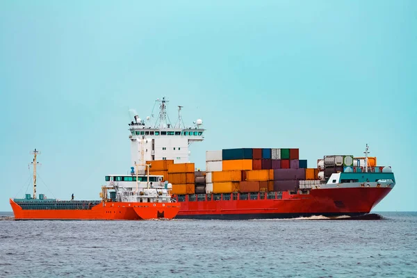 Red container ship. Logistics and production export