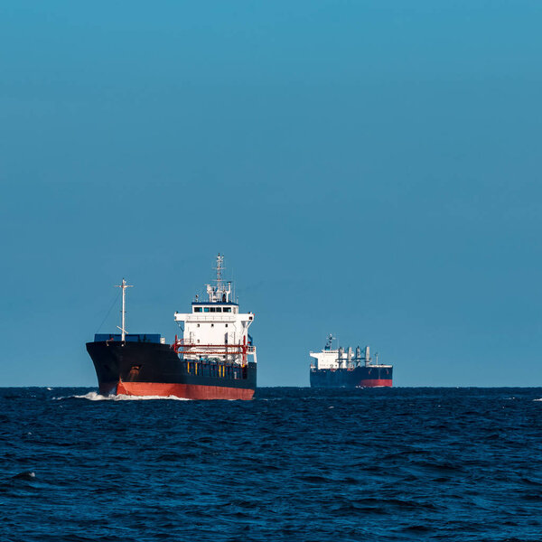 Black bulker ship. Logistics and merchandise transportations