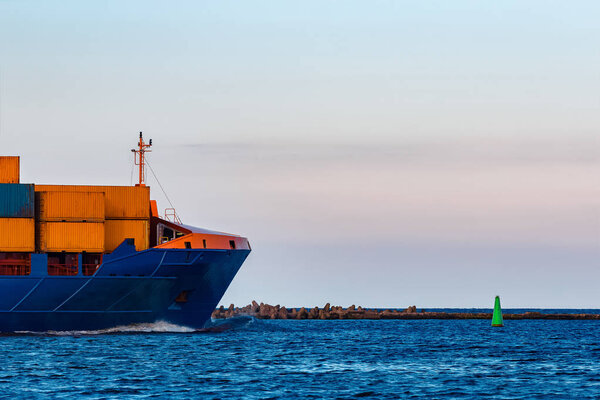 Blue container ship. Global logistics and merchandise transfer