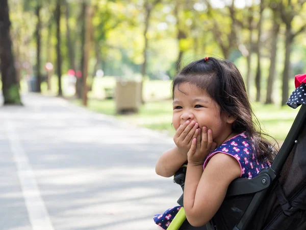 Little Asian Girl Sitting Stroller Public Park She Look Haply — Stock Photo, Image