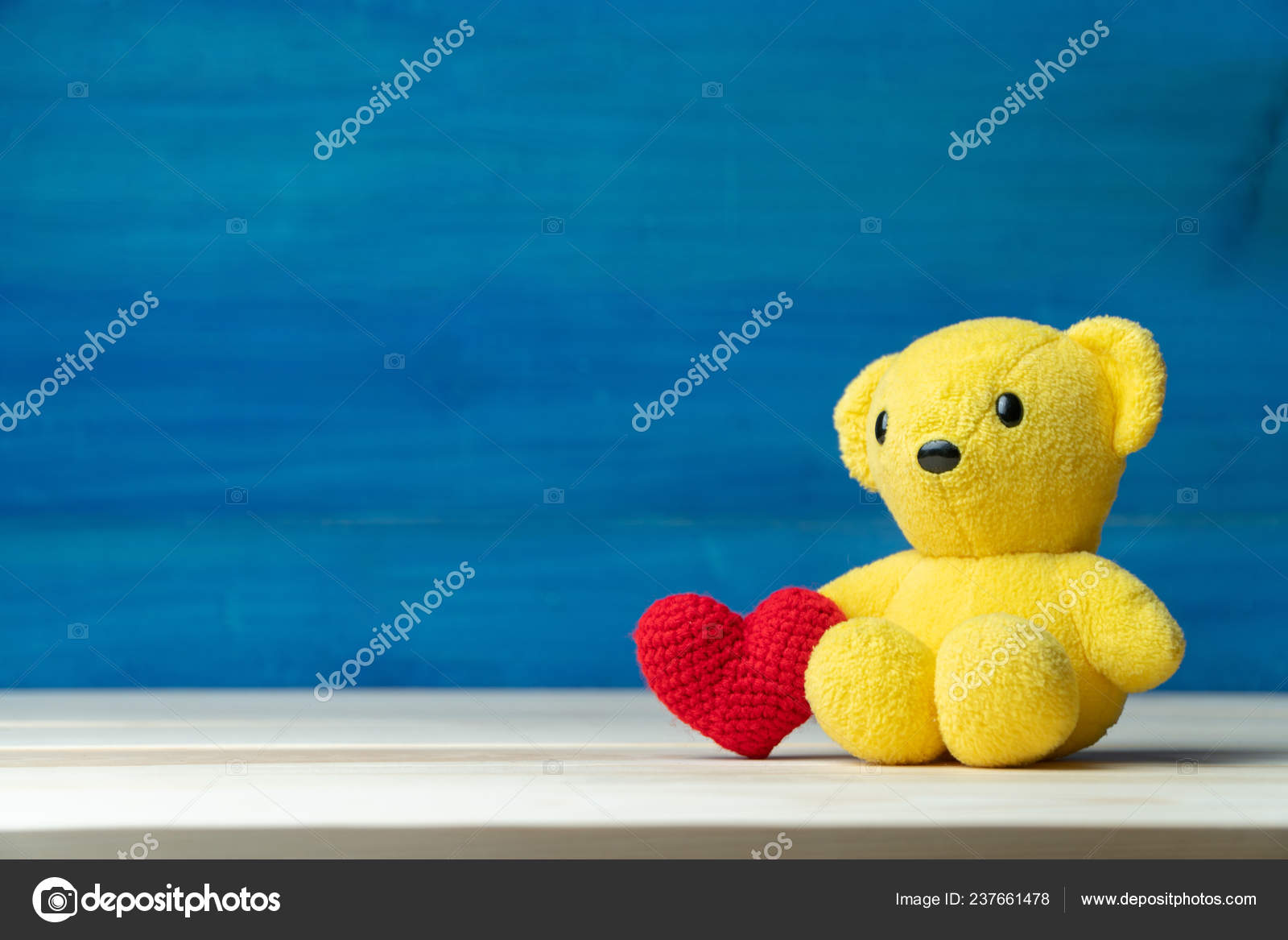 blue and yellow teddy bear