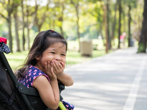 Little Asian Girl Sitting Stroller Public Park She Look Happly — Stock Photo, Image