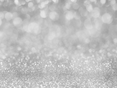 Bokeh ile soyut glitter gri arka plan. romantik arka plan, ışık bokeh tatil parti arka plan için Noel ve yeni yıl arifesi arka plan bulanık yumuşak gri ışıklar