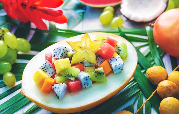 Exotic Tropical Fruits Salad Served Half Melon Leaves Palm Trees — Stock Photo, Image