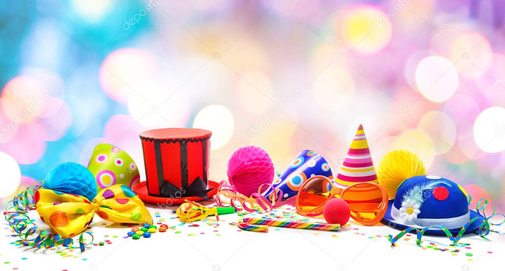 Colorful birthday or carnival background with party items isolated on white. Festivity concept
