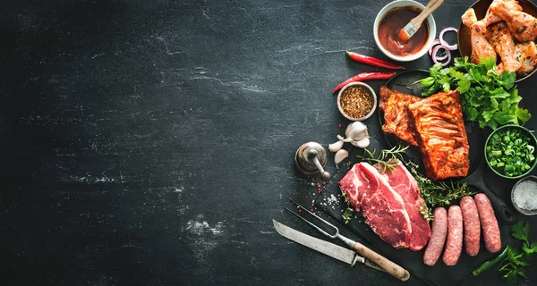 Various kinds of grill and bbq meats with vintage kitchen and bu Stock Picture