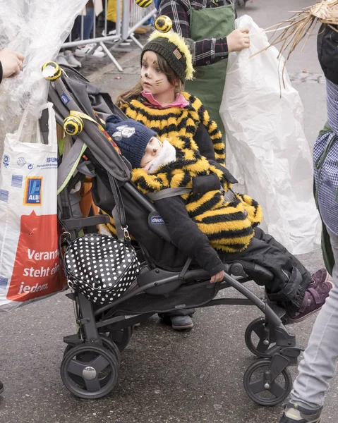 Dressed up baby in stroller at Carnival parade, Stuttgart — Stock Photo, Image