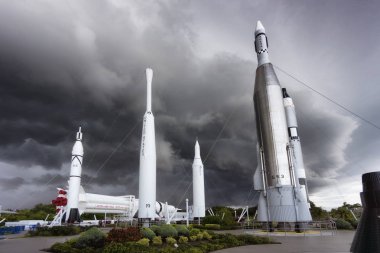 Cape Canaveral, Florida, USA - JUNE 12, 2018: Kennedy Space Center Rocket Garden before the storm. clipart