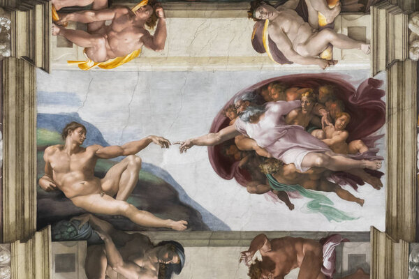 The Creation of Adam: Ceiling of the Sistine chapel in the Vatican museum in Rome