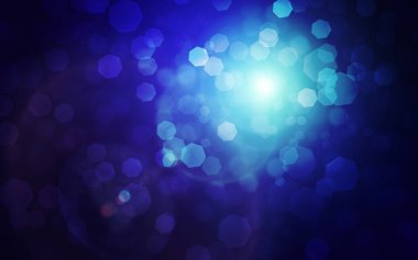 Mavi koyu arka plan ile bokeh ve birden parlamak ışık ve ışınları