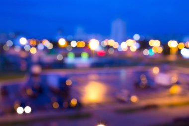 Cityscape gece ufuk arka plan. Bokeh ve ışıklar ile arka plan