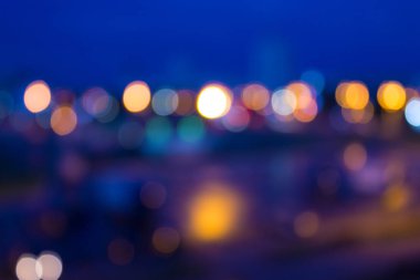 Cityscape gece ufuk arka plan. Bokeh ve ışıklar ile arka plan