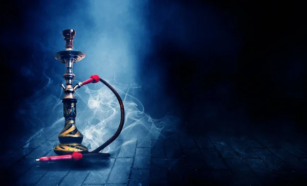 Hookah on a dark abstract background, smoke, fog, neon, concrete
