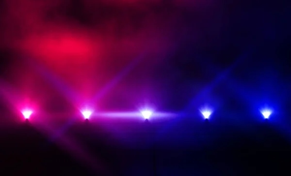 Background of an empty room, reflection of neon light on a concrete floor, puffs of smoke
