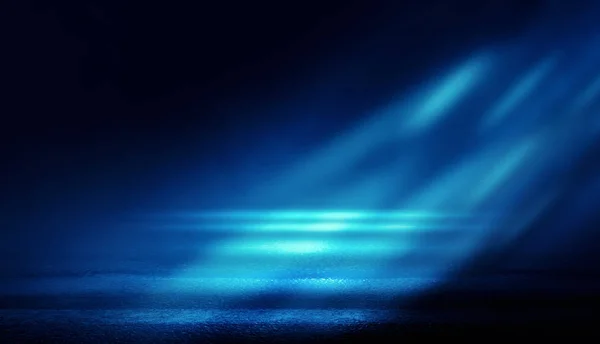 Background of empty dark room with rays of light. Concrete floor with light reflection. Smoke, neon blue light