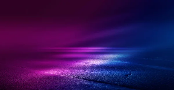 Background of empty room with concrete pavement. Blue and pink neon light. Smoke, fog, wet asphalt with reflection of lights