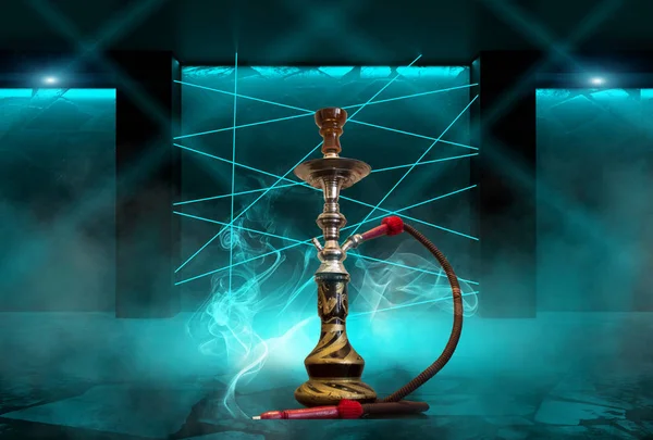 Hookah with smoke on the background of a concrete pavement with blue laser beams, neon light, smoke