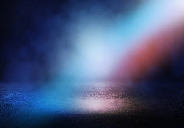Dark empty stage, blue and orange neon spotlight, wet asphalt, s