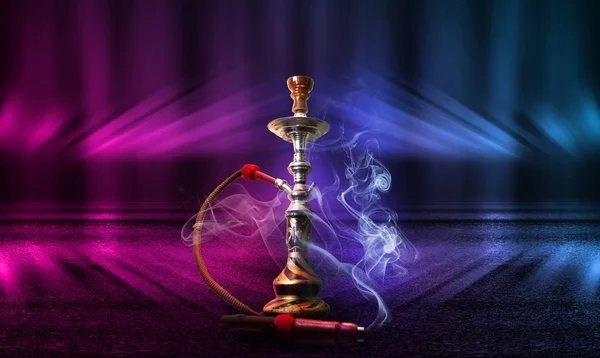 Hookah, smoke on a dark abstract background. Background of empty scenes with multicolored neon lights, reflection of night lights on wet pavement