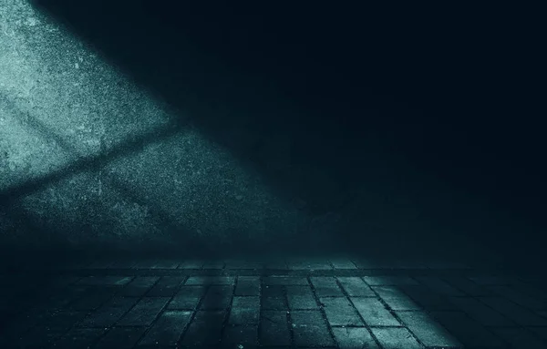 Empty scene background. Incident light from a window on an empty brick wall. Dark abstract background
