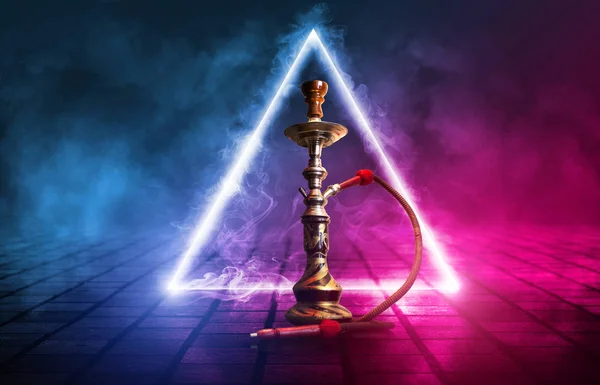 Hookah, smoke on a dark abstract background. Background of empty scenes with multicolored neon lights, reflection of night lights on wet pavement