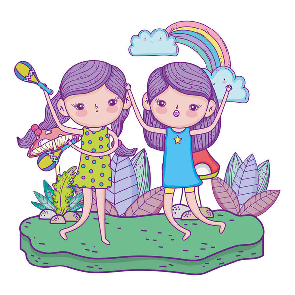 милые маленькие девочки играют в маракасы в пейзаже
