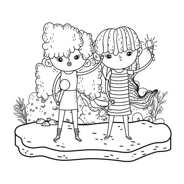 милые маленькие девочки играют в маракасы и поют
