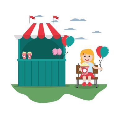 Karnaval dükkanı ve balonlarla oturma kız