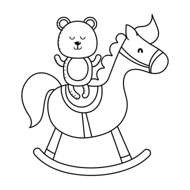 Teddy ve siyah beyaz tahta at