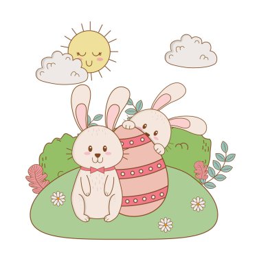 bahçede boyalı yumurta ile küçük tavşan