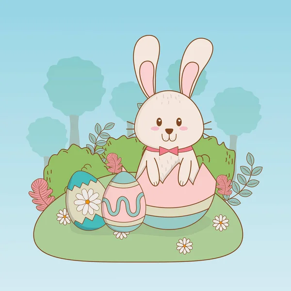 Piccolo coniglio con uova dipinte carattere pasquale — Vettoriale Stock