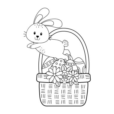 küçük tavşan yumurta Paskalya sepetinde boyalı.