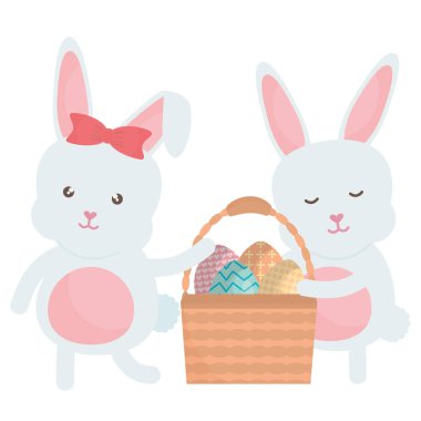 Paskalya yumurtaları ile sevimli tavşan sepet içinde boyalı