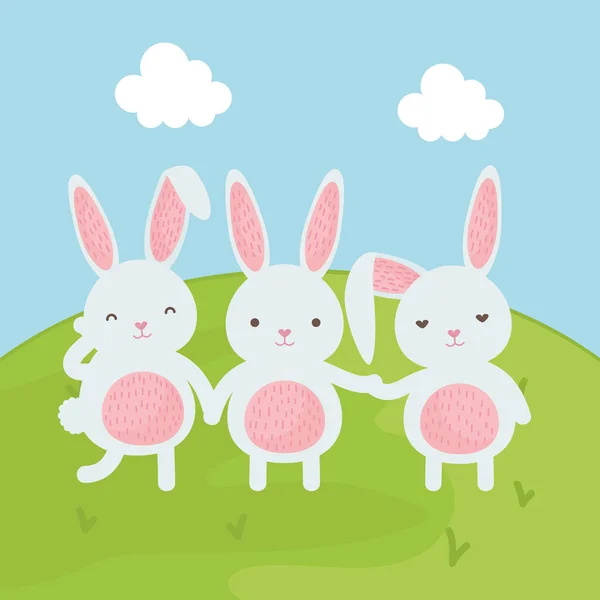 Cute rabbits in the field — Stock Vector