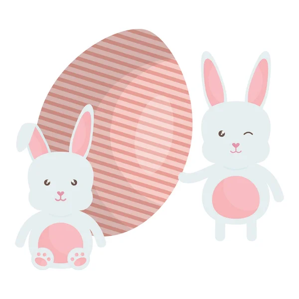 Милые кролики с нарисованными пасхальными яйцами — стоковый вектор