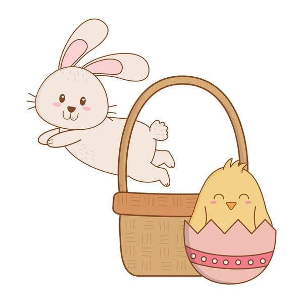 Conejito y pollito con huevo pintado en cesta — Vector de stock