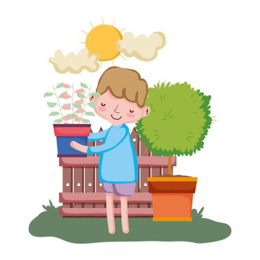 küçük çocuk ağaç ve çit ile houseplant kaldırma