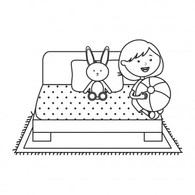 yatakta plastik balon ve tavşan ile sevimli küçük kız