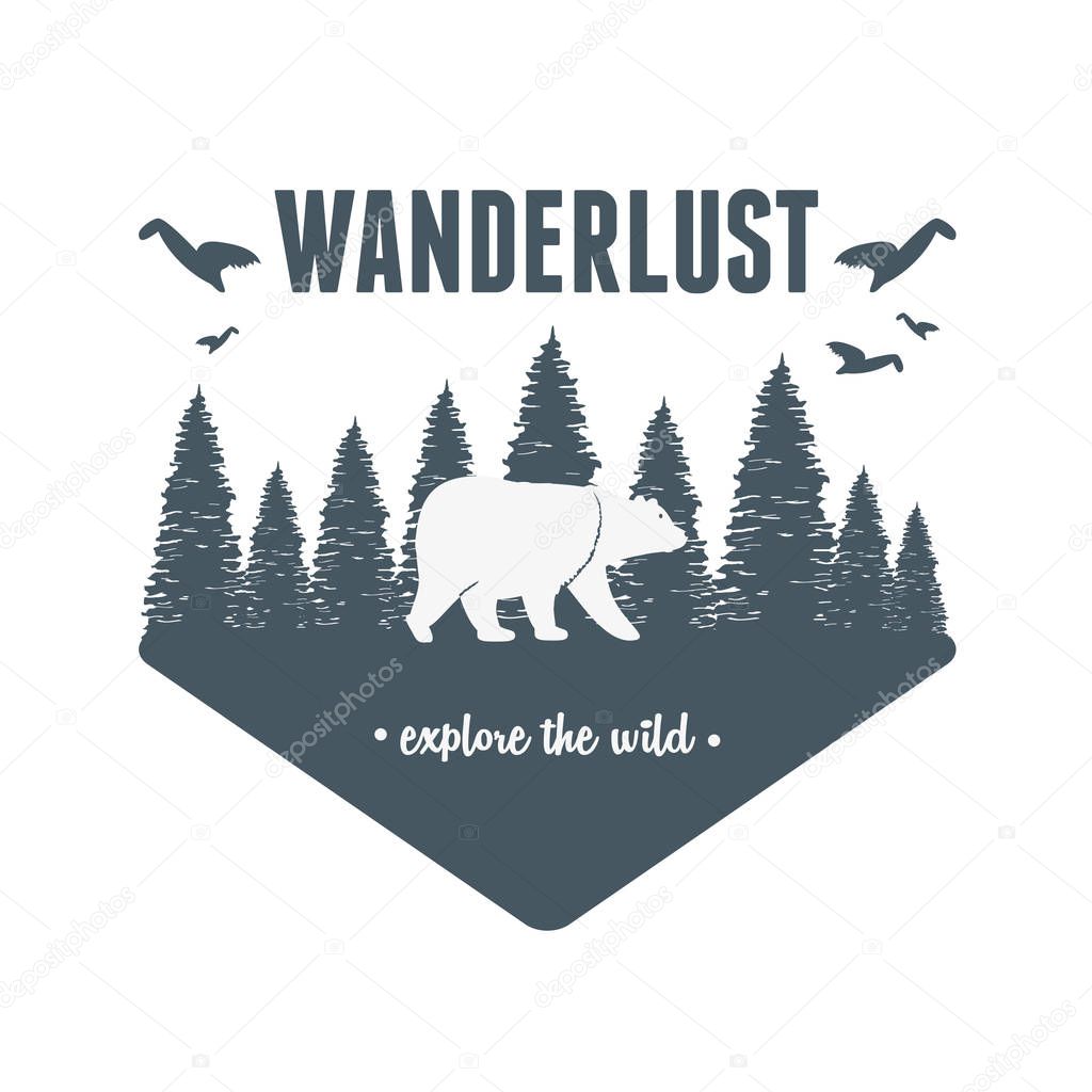 wanderlust label with forest scene and grizzly bear