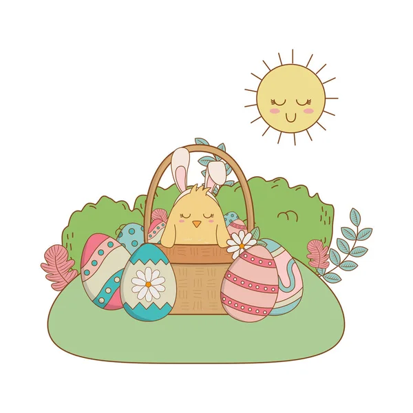 Pinto com orelhas coelho em cesta e ovos pintados cena jardim — Vetor de Stock
