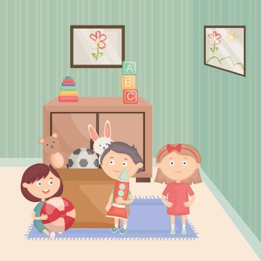 küçük çocuk grubu odada oyuncaklar ile oynuyor