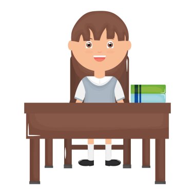 Okul masasında ders kitapları ile sevimli küçük öğrenci kız