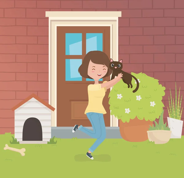 Mulher com mascote gato pequeno bonito no jardim da casa —  Vetores de Stock