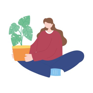 Ot dekorasyonunda saksı bitkisi olan genç bir kadın izole edilmiş beyaz arkaplan