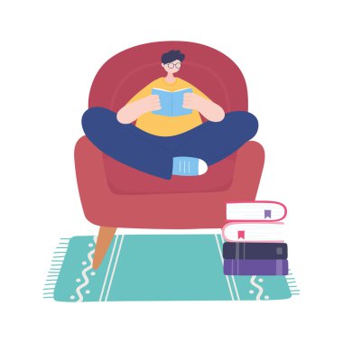 Evde oturup sandalyeyle ilgili kitap okuyan, kendini izole eden, Coronavirus karantinasında faaliyet gösteren adam.