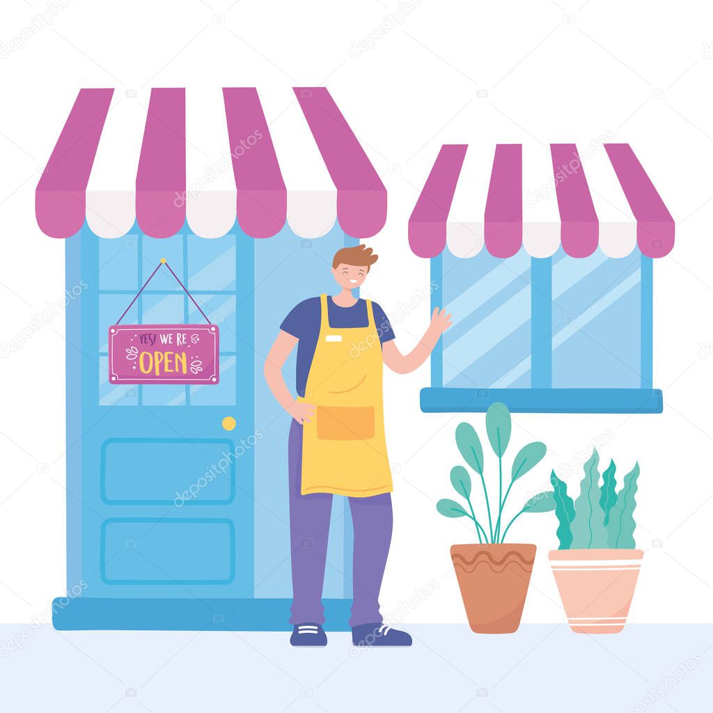 we are open sign, young employee man with apron exterior market with banner and plants